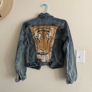 Somedays Lovin denim Jacket with tiger in the back.